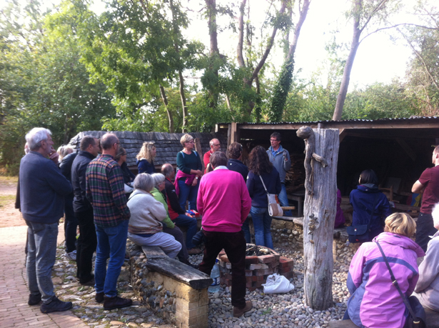 Brian talks to visitors about timber frame repairs